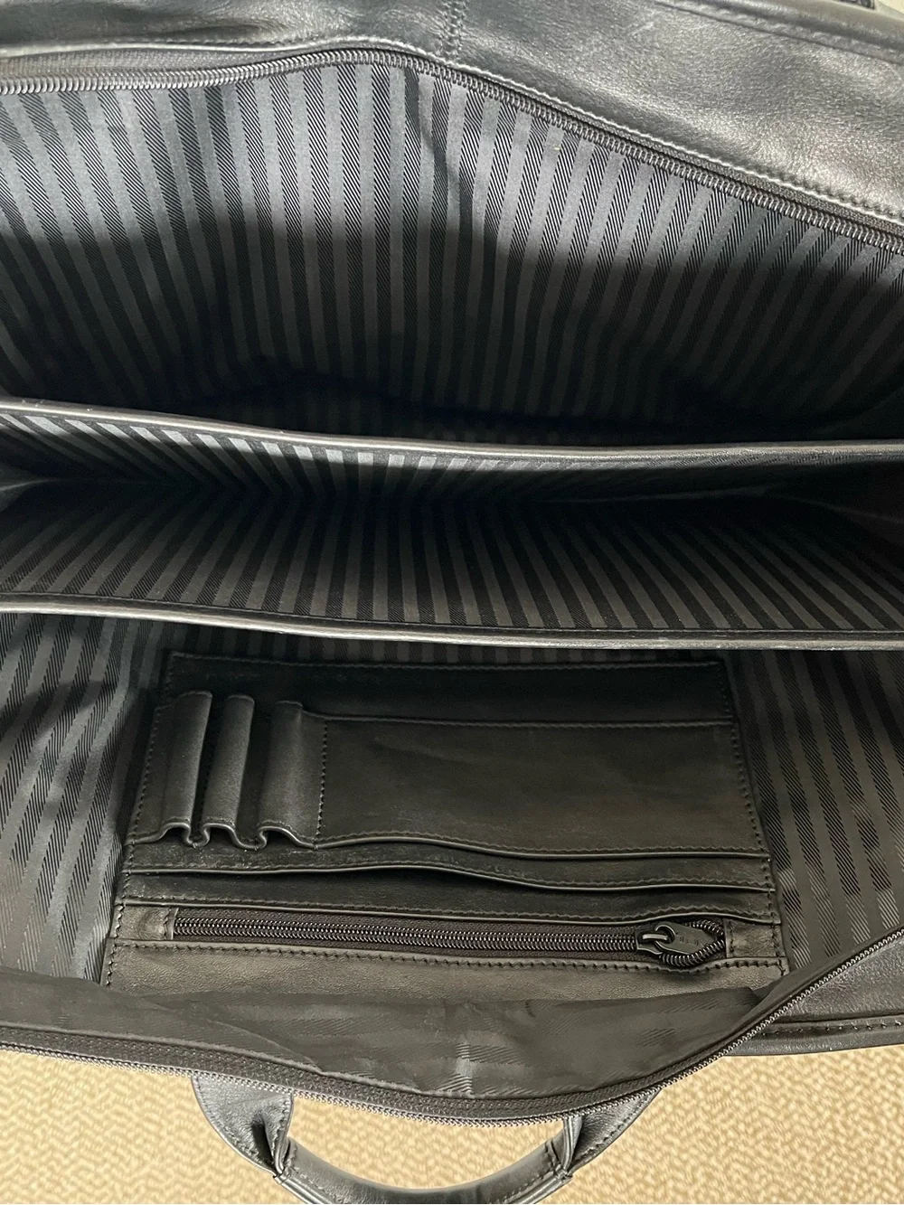 Tumi sleek leather